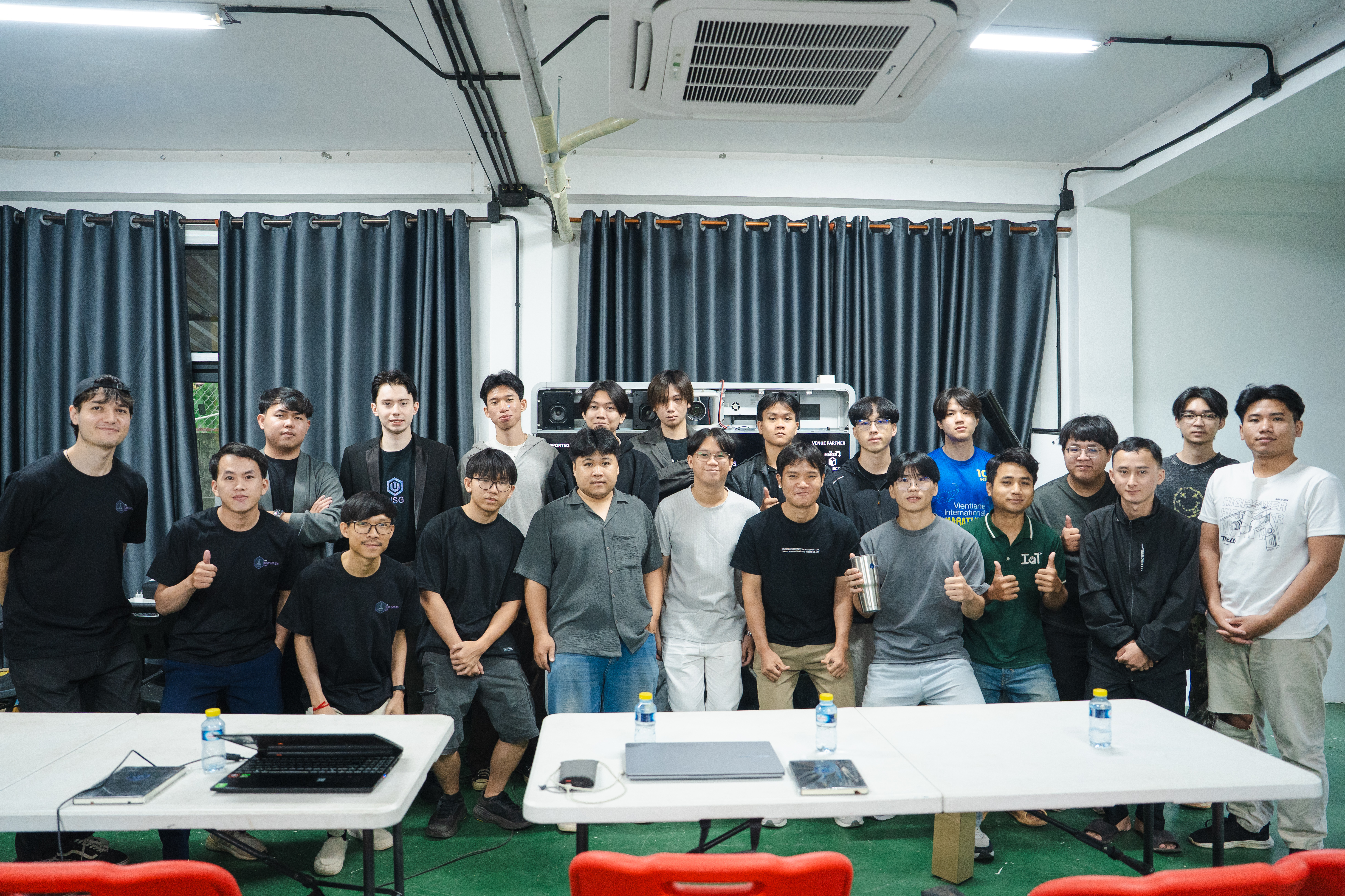 Group photo of speakers and attendees at the AWS User Group Lao Q3 2026 meetup